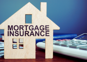 Mortgage Insurance written on a wooden house model