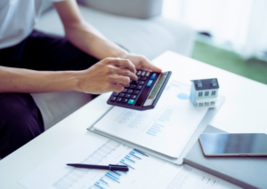 mortgage calculator tools in hand